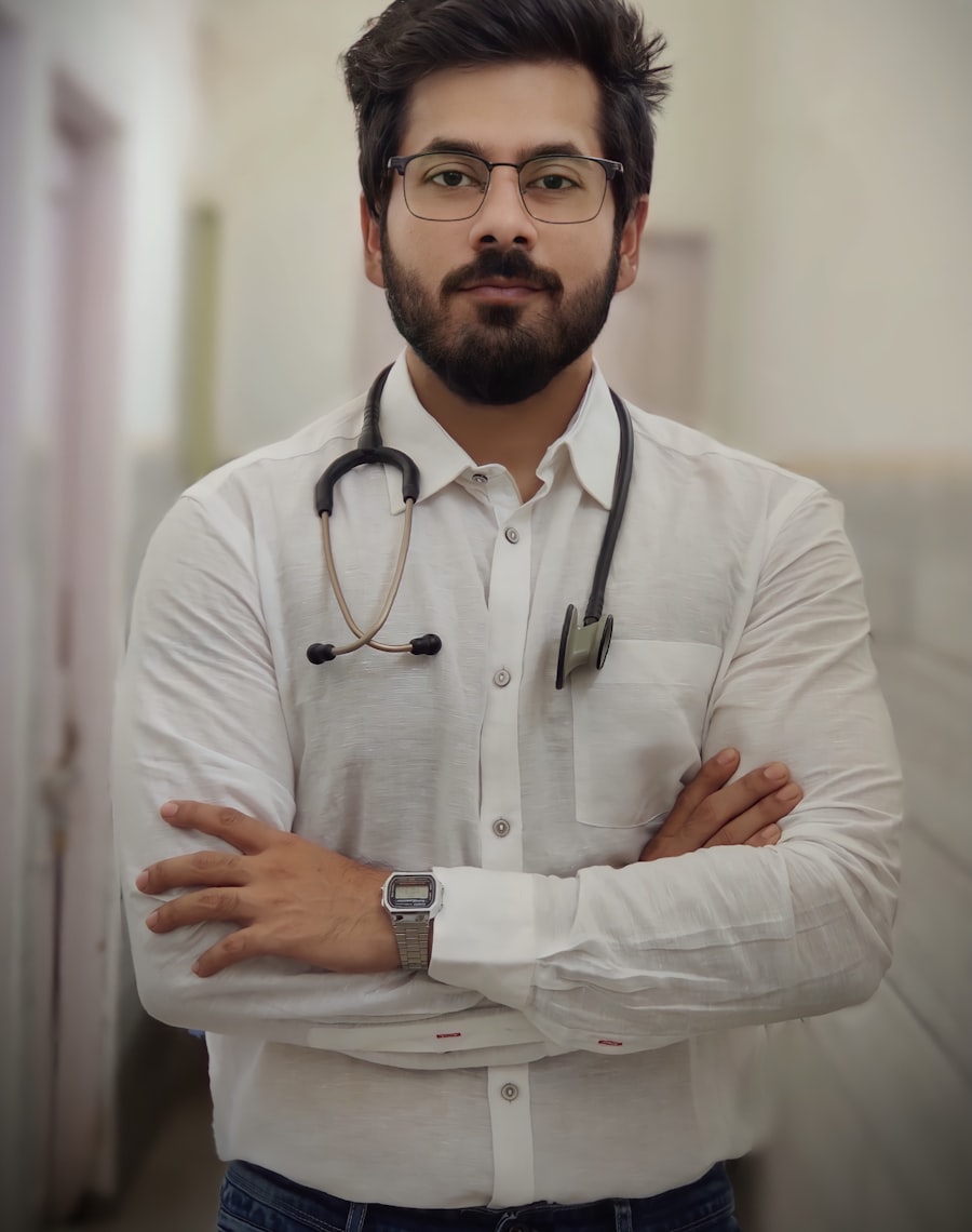 Doctor with a stethoscope standing with arms folded