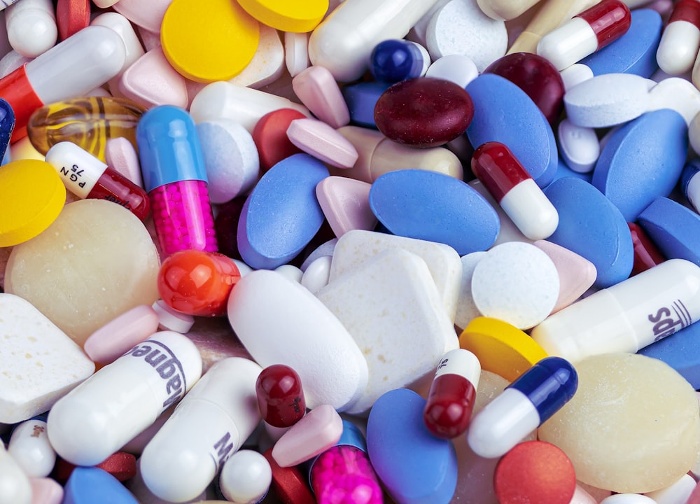 Assorted medication tablets and capsules